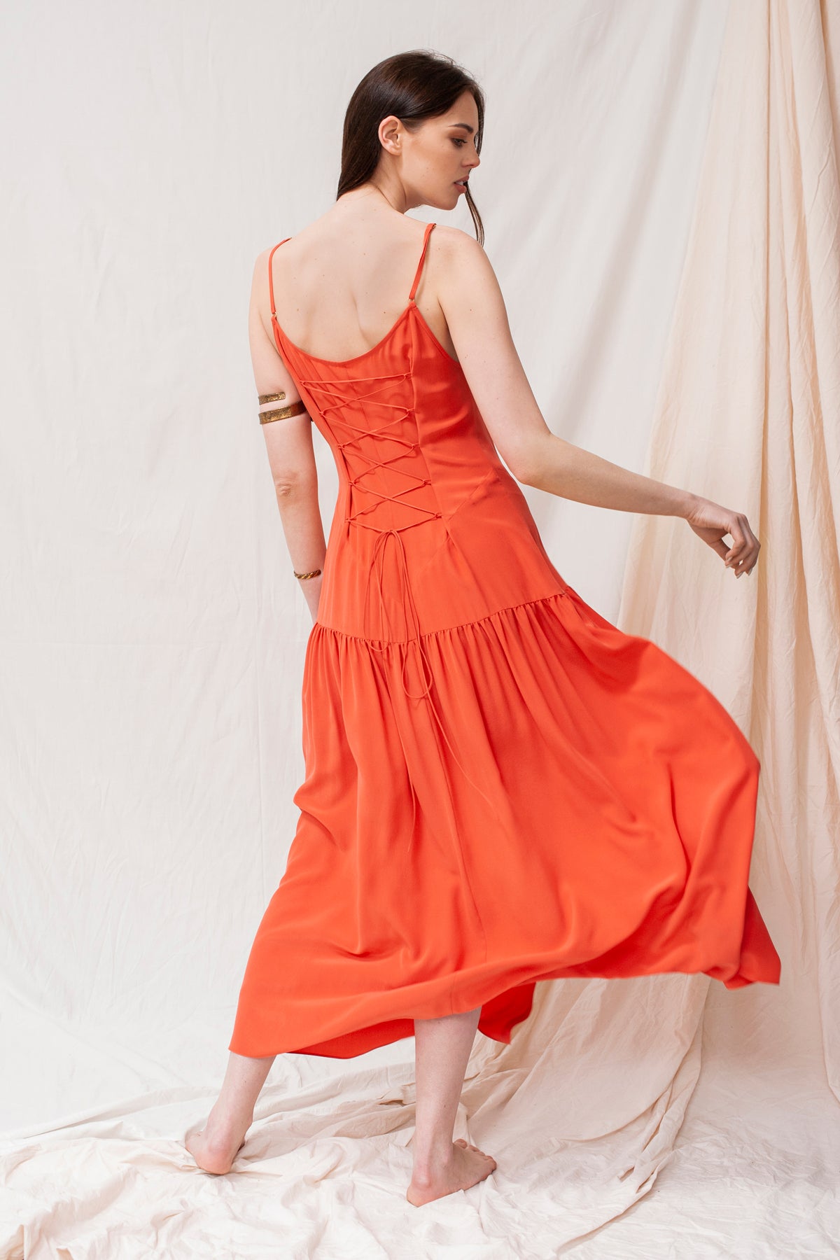 Coral Celina maxi dress with tiered skirt, adjustable straps, ruched back, sustainable and handmade organic fabric.