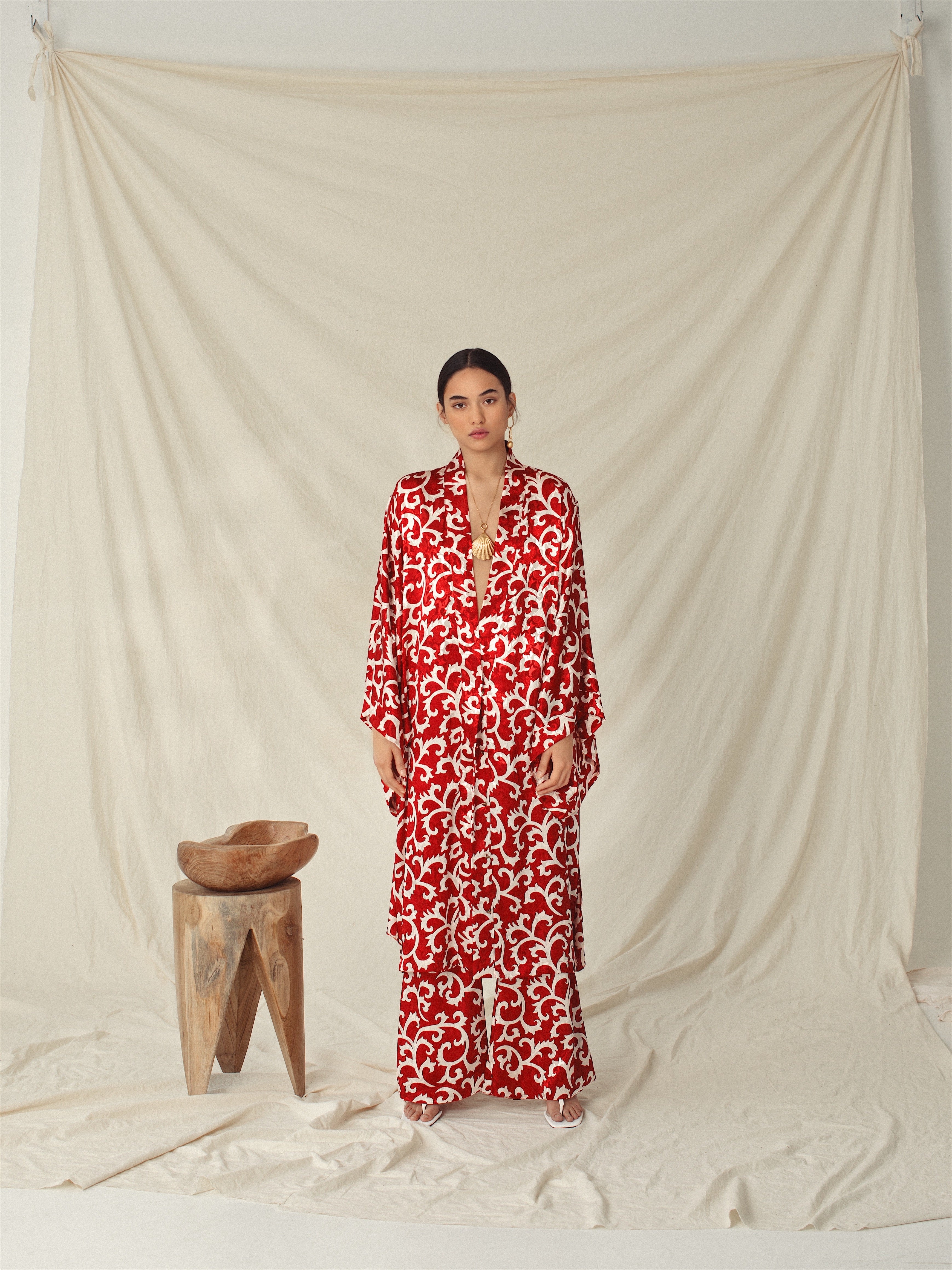 Red ruby signature kimono with bold white floral pattern, sustainable, handmade, eco-friendly, organic fabric, and ethical.