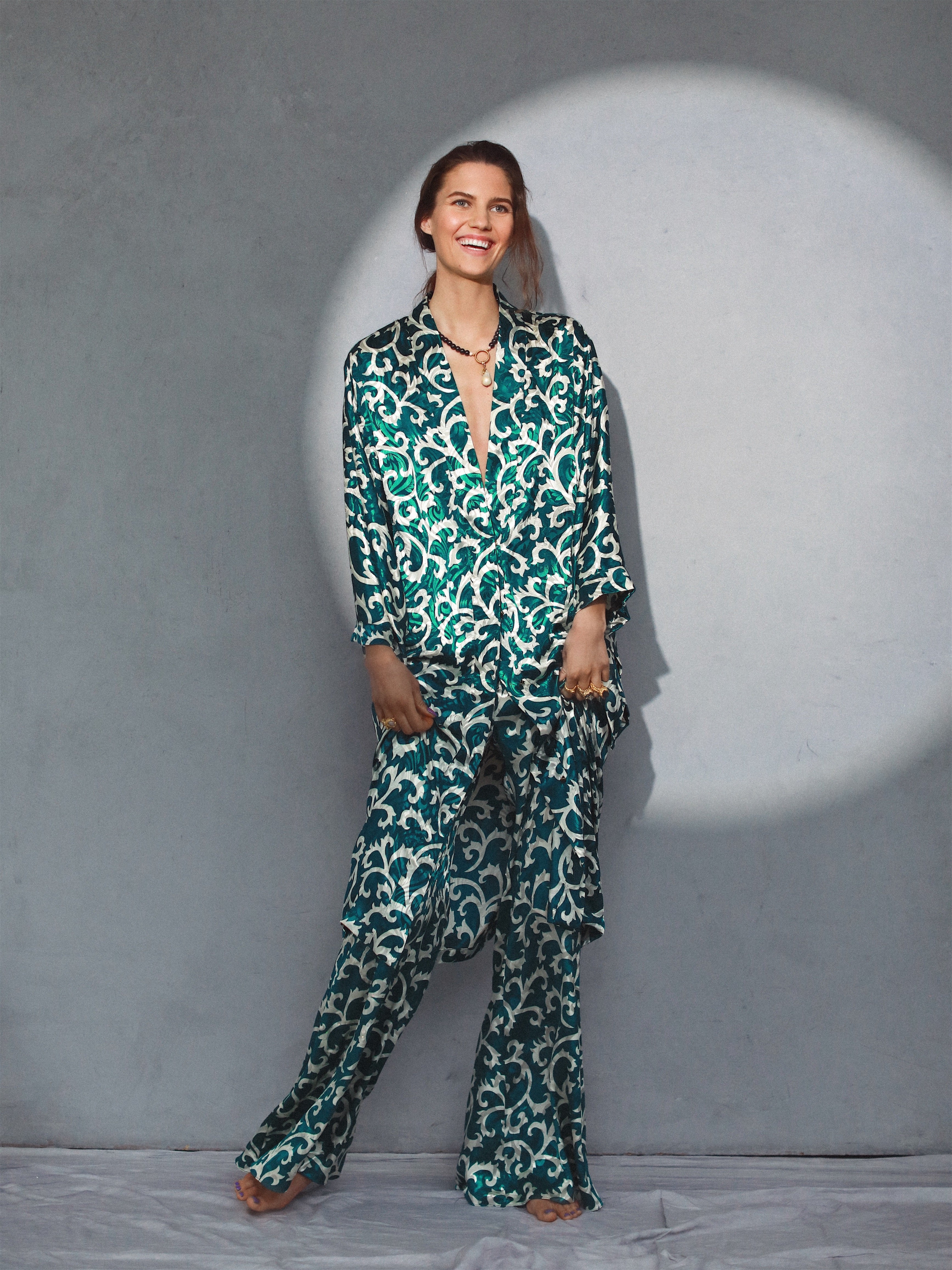 Emerald green sustainable kimono with white organic pattern, long sleeves, relaxed fit, handmade eco-friendly fabric.