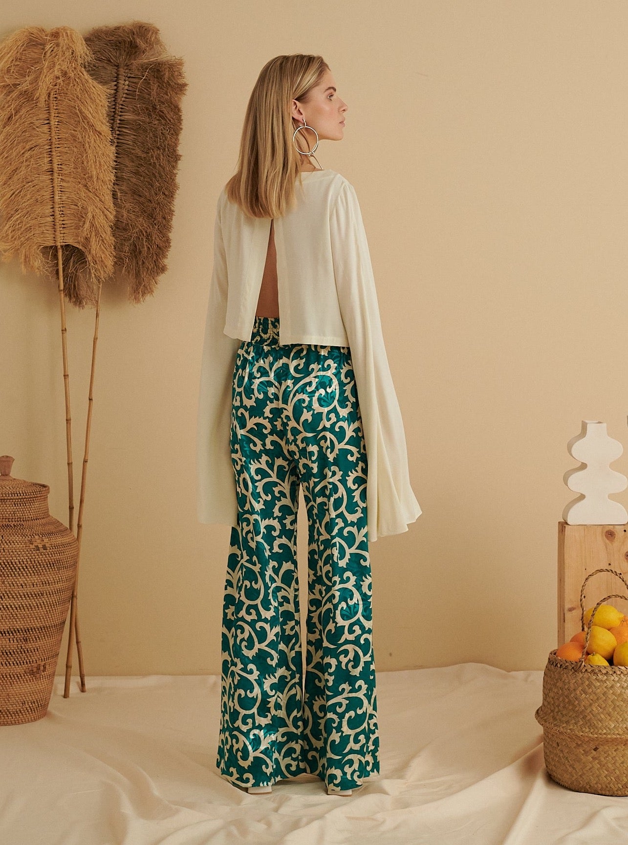 FLARED SIGNATURE TROUSERS IN EMERALD GREEN