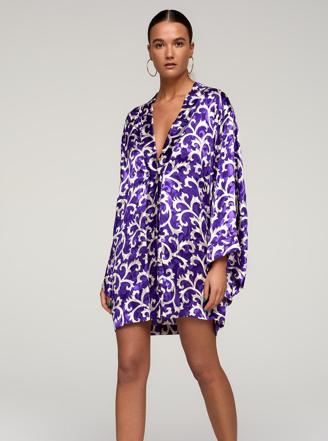 Oversized purple shirt with white abstract print, long sleeves, sustainable handmade eco-friendly organic fabric.