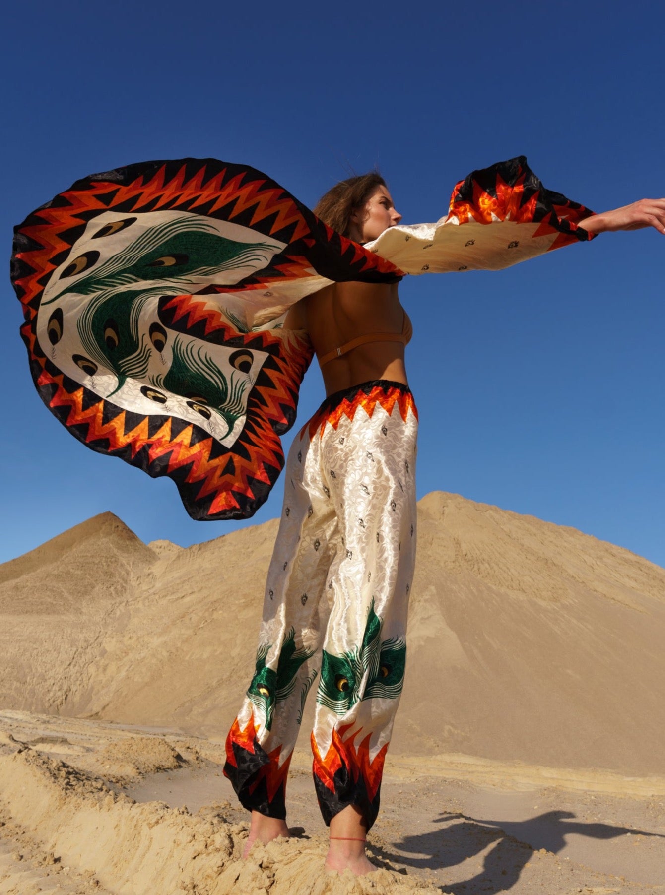 Flowing black onyx kimono with vibrant flames print, sustainable and handmade design.