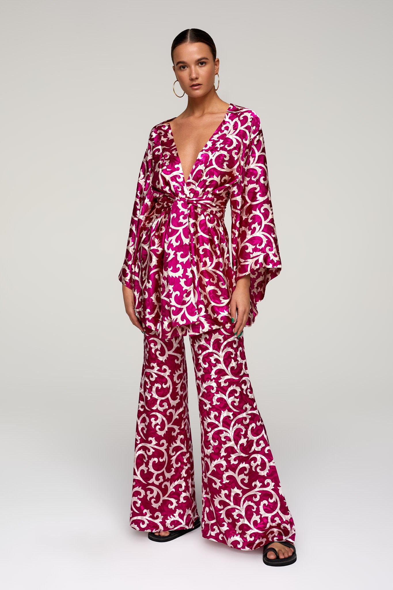 FLARED SIGNATURE TROUSERS IN MAGENTA