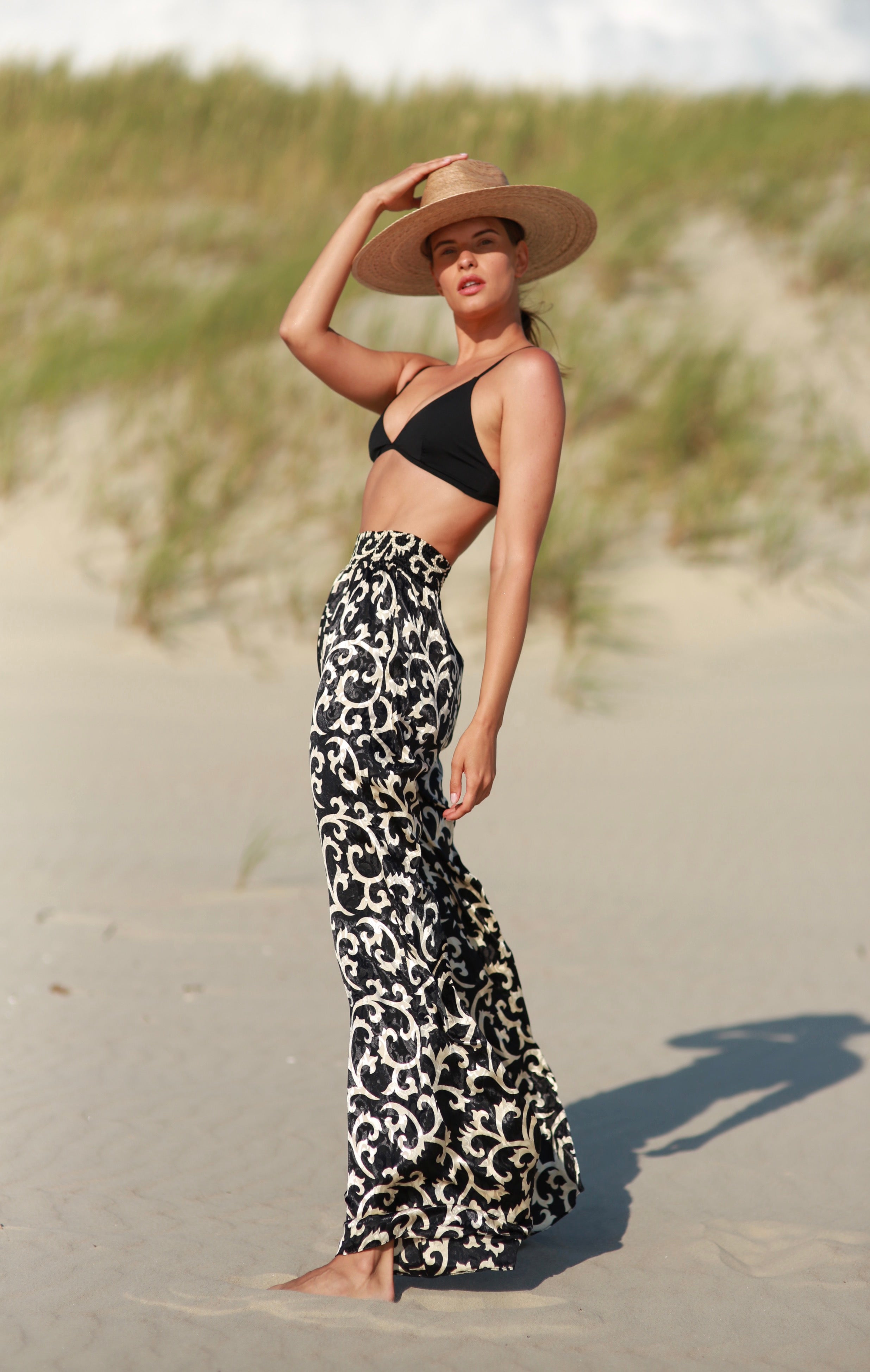 FLARED SIGNATURE TROUSERS IN BLACK ONYX